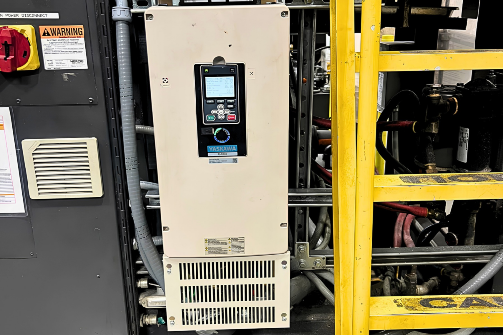 Yaskawa GA800 VFD installed on an industrial extruder after troubleshooting a recurring motor-stall condition